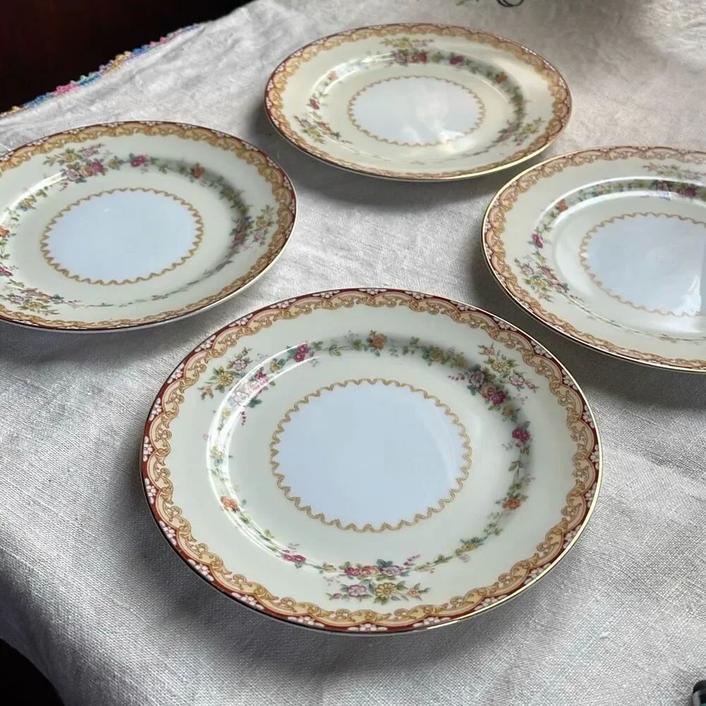 Lot of 4 Noritake China Dimity pattern bread plates.